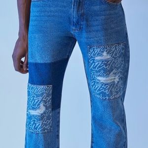 Brand new with tag light washed denim pants with patchwork details